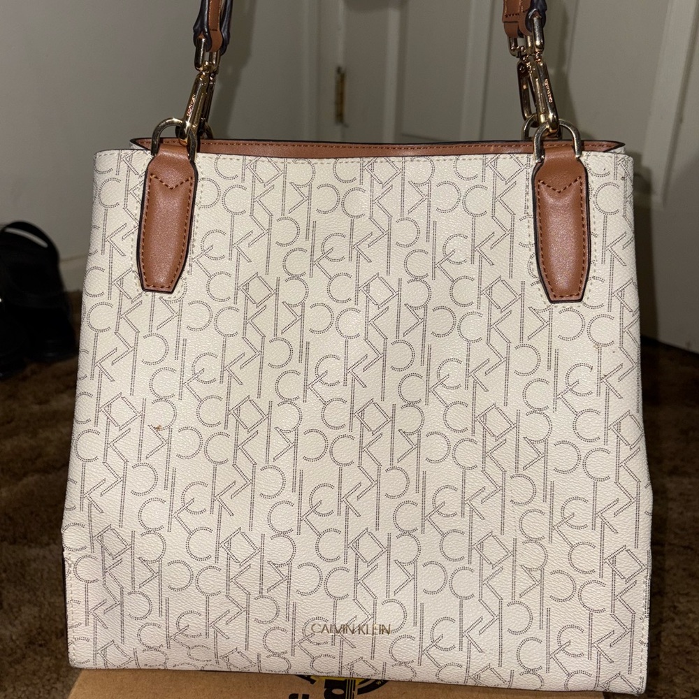 Calvin Klein Logo Print Shoulder Bag in Cream and Tan